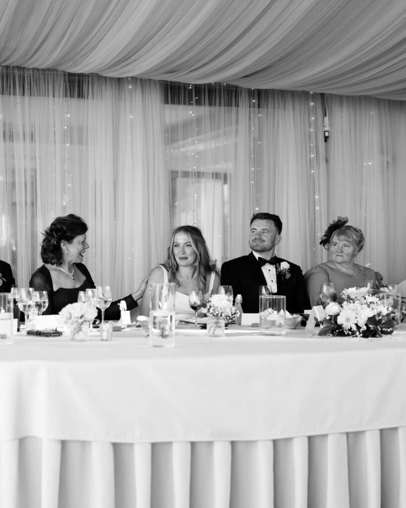 Bride and groom preparing for toast at Villa Antiche Mura